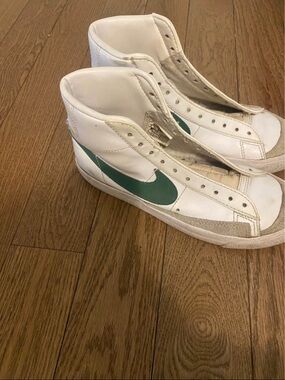 Nike White High-Top Sneakers with Green Swoosh